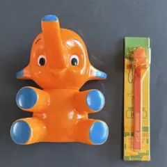 昭和レトロ サトちゃんの貯金箱 オレンジ ソフビ - メルカリ