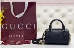 GUCCI GGエンボス ミニ ショルダーバッグ