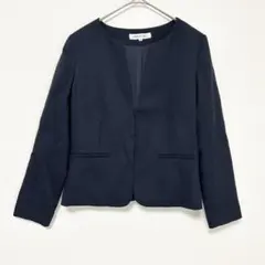 ◎ ナチュラルビューティーベーシック　ノーカラージャケット ネイビー Mのサムネイル