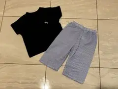 黒ポケットTシャツとストライプパンツセット