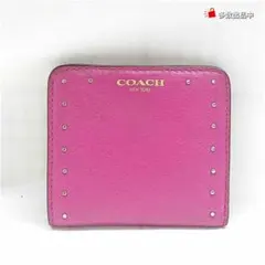 COACH 二つ折り財布 スタッズ ピンク レディース ミニウォレット