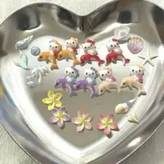 No.902 日焼けハローキティ ピンクイルカ ネイルパーツ5個 - メルカリ