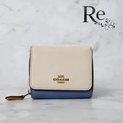 新品 COACH 三つ折り財布 青/ベージュ - メルカリ