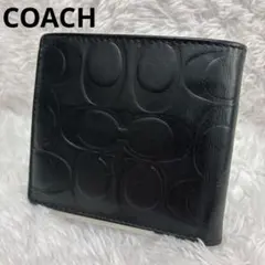 COACH スリムウォレット 二つ折り財布 レザー　黒　エンボス　型押しのサムネイル