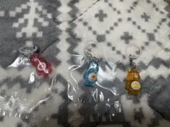ケアベア　クリアマスコットチャーム2 めじるしアクセサリー　赤　青　黄