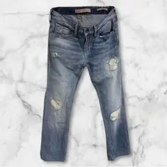 【本革パッチ】GUESS ゲス スリムストレート ダメージ加工 デニムジーンズのサムネイル