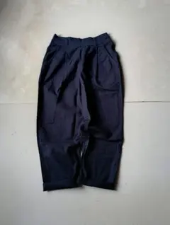 アデュートリステス　コンジェペイエ　コットン　タック入　テーパード　パンツ