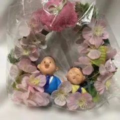 桜の花とカップルのフィギュアのリース