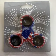 非売品】EXPO2025 アメリカ館 ハンドスピナー - メルカリ