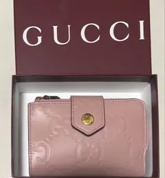 GUCCI GGエンボス 二つ折り財布 ピンク