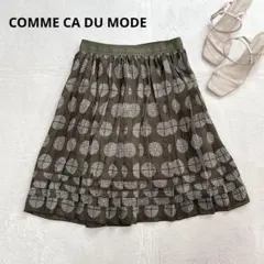 v28 COMME ÇA DU MODE 幾何学柄 プリーツスカート カーキ系のサムネイル