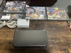 Newニンテンドー3DS（メタリックブラック）の本体、純正充電器とソフトのセット