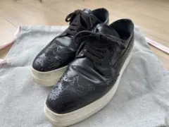 PRADA（プラダ）厚底ウィングチップ スニーカー／ブラック×ホワイトソール