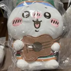 ウクレレを持ったハチワレぬいぐるみ