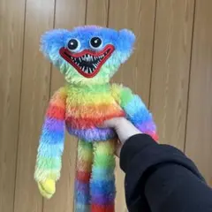 レインボーカラーのぬいぐるみ