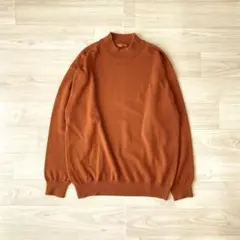 オレンジ タートルネック