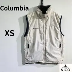 コロンビア リバーシブル 中綿ベスト プリマロフト インターチェンジ XS 茶白