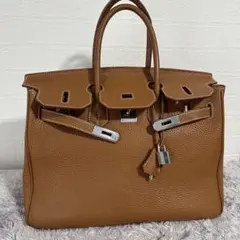 ブラウン レザーハンドバッグシルバー金具 カデナ.ショルダー付属 