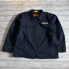 CINTAS L ワークジャケット 紺 企業ロゴ キルティング裏地 古着ワッペン