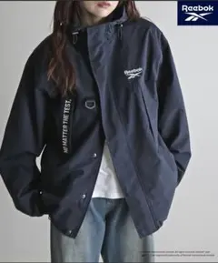 【Reebok/リーボック】別注 スモールベクター刺繍ナイロンマウンテンパーカーのサムネイル