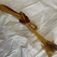 赤と金黄色の編み込み帯締め