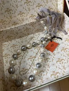 radiu コットンパールとリボン　ロングネックレス
