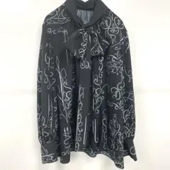 DAMA collection ボウタイブラウス 長袖 総柄 ブラックゆったりめのサムネイル
