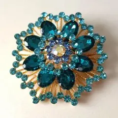 k*i様 ターコイズ色の花形ブローチ