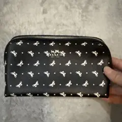 COACH 蝶々柄ポーチ