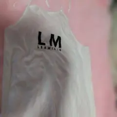 ReebokLES MILLS ホワイトタンクトップ LMロゴ入り