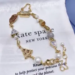 K034/kate spade/ゴールド エナメルティーカップブレスレット - メルカリ