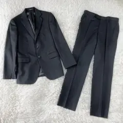 ✨美品✨コムサイズム　メンズスーツ　礼服　ブラックフォーマル　黒　無地　S
