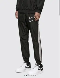 NIKE double logo track pants size S