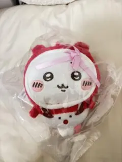 赤と白のキャラクターぬいぐるみ