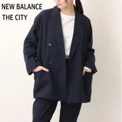 ニューバランスTHE CITYネイビーダブルテーラドジャケット洗える