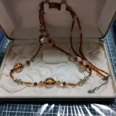 オレンジゴールドビーズのロングネックレス　ケースなし