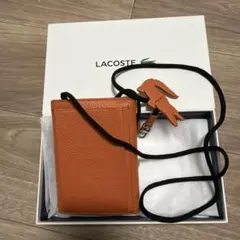LACOSTE オレンジ スマホショルダーバッグ