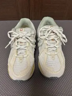 AURALEE × New Balance 1906R 