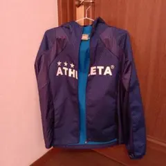 ATHLETA ピステ・ウィンドブレーカー M ネイビー