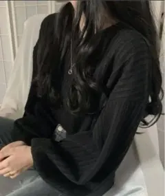 リブ編みフレア袖ニットセーター 黒