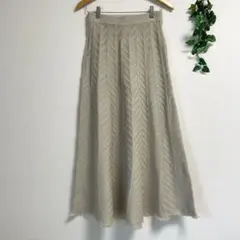 ベージュ 編みニット ケーブル編み ニットスカート フレアスカート フリンジ