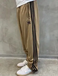 新品 adidasアディダスオリジナルスファイヤーバードトラックパンツ茶2XL