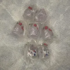 ハローキティ　モンチッチ　めじるしアクセサリー 7点セット