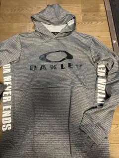 Oakley グレー フード付きパーカー L