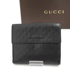 希少 グッチ 二つ折り財布 がま口 GGキャンバス インターロッキング 黒