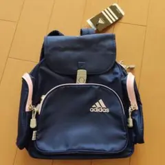 新品タグ付アディダスadidas紺色×ピンクリュック　7Ｌ
