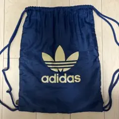 adidas ネイビー ナップザック 金ロゴ