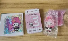 サンリオ マイメロディ　缶　ホログラムステッカー　ケースつきアクリルチャーム