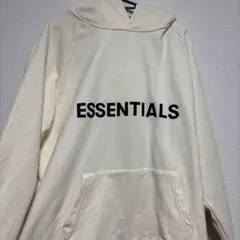 ESSENTIALS フロントプリント パーカー クリーム色