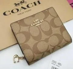 COACH 二つ折り財布 猫 プリント ねこ ネコ - メルカリ